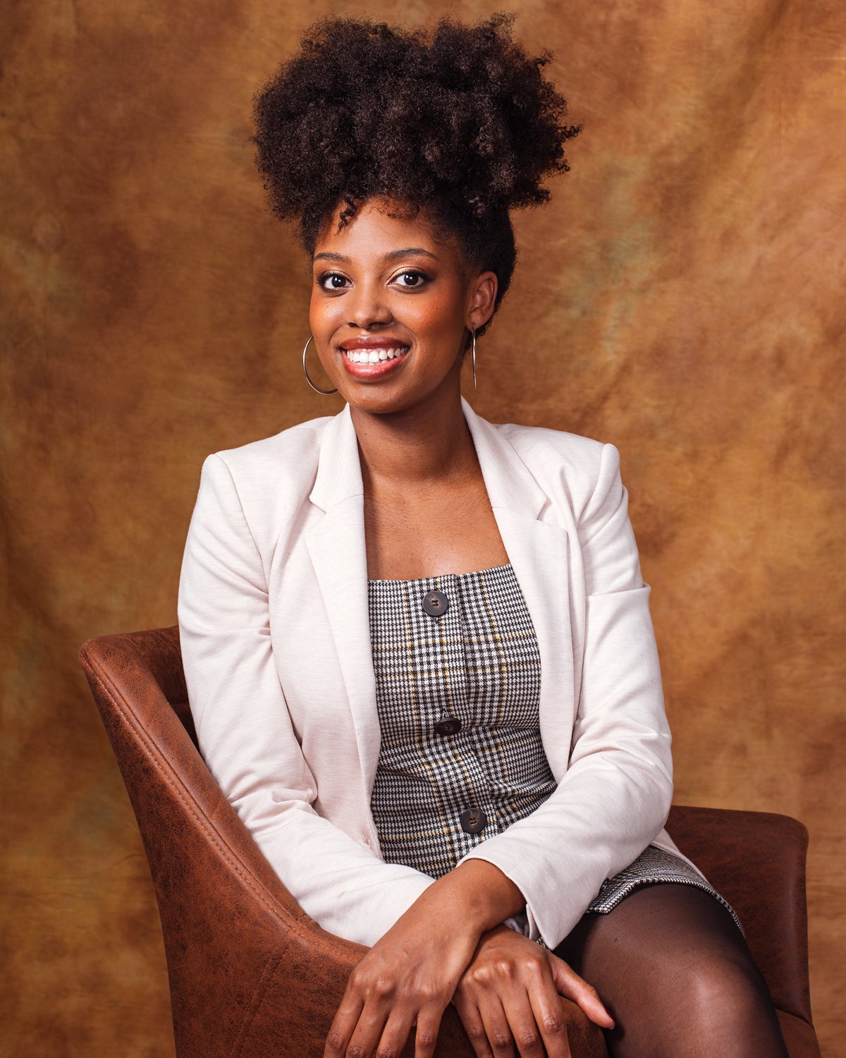 This Photographer Is Redefining What Professional Looks Like For Black Women With 4C Hair