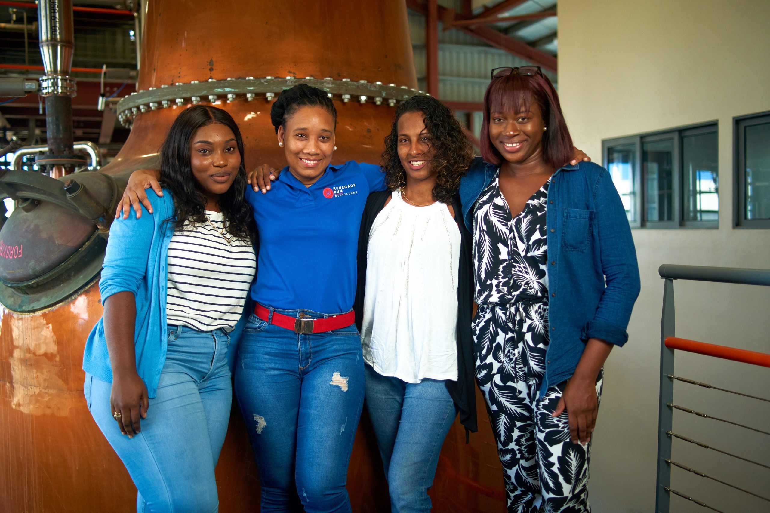  We’ll Drink To That: Meet The History-Making Distillers Team Run By Black Women Making An Impact Along With Rum