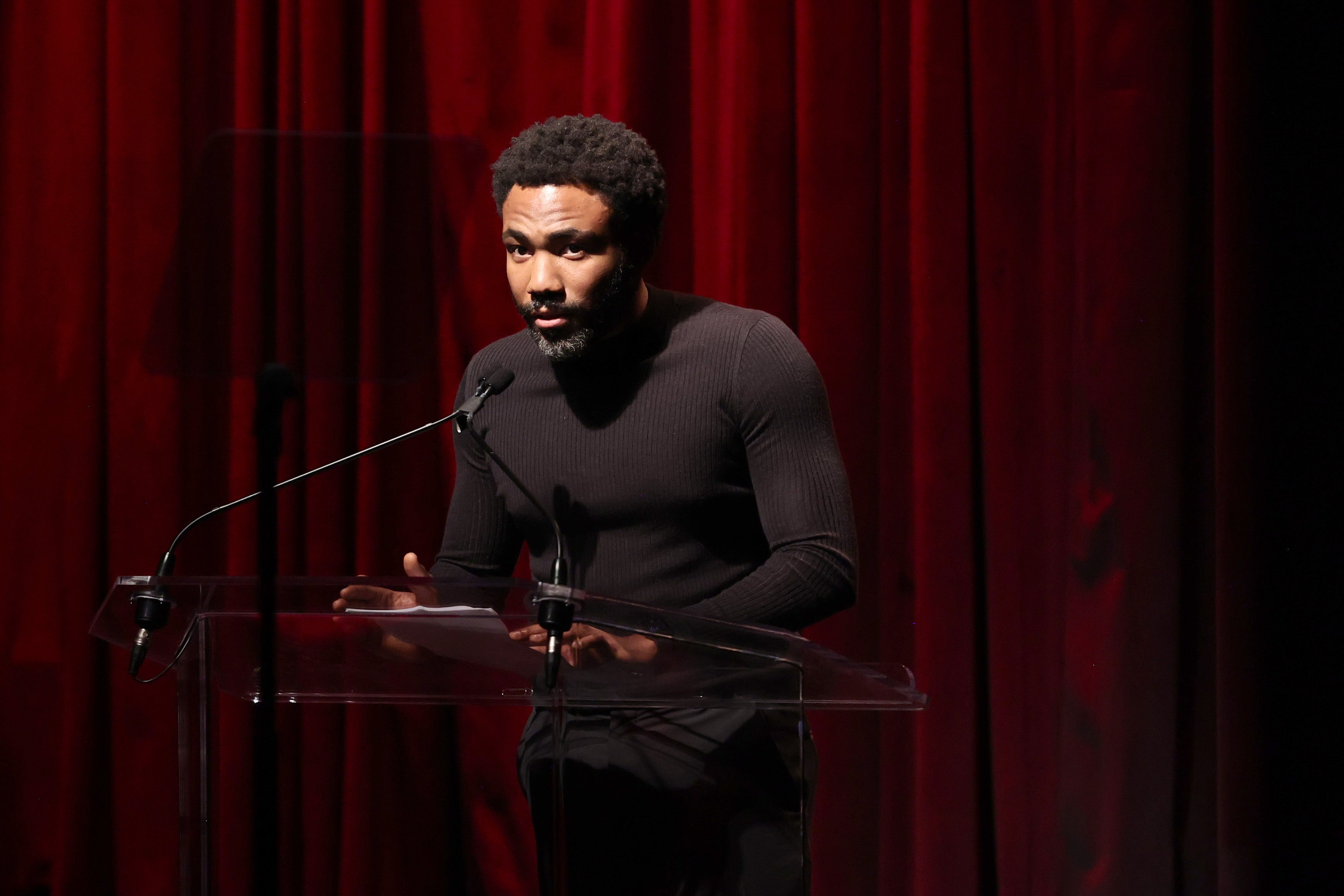 Donald Glover Calls Out Chevy Chase's Use Of The N-Word During Writer's Guild Presentation Speech