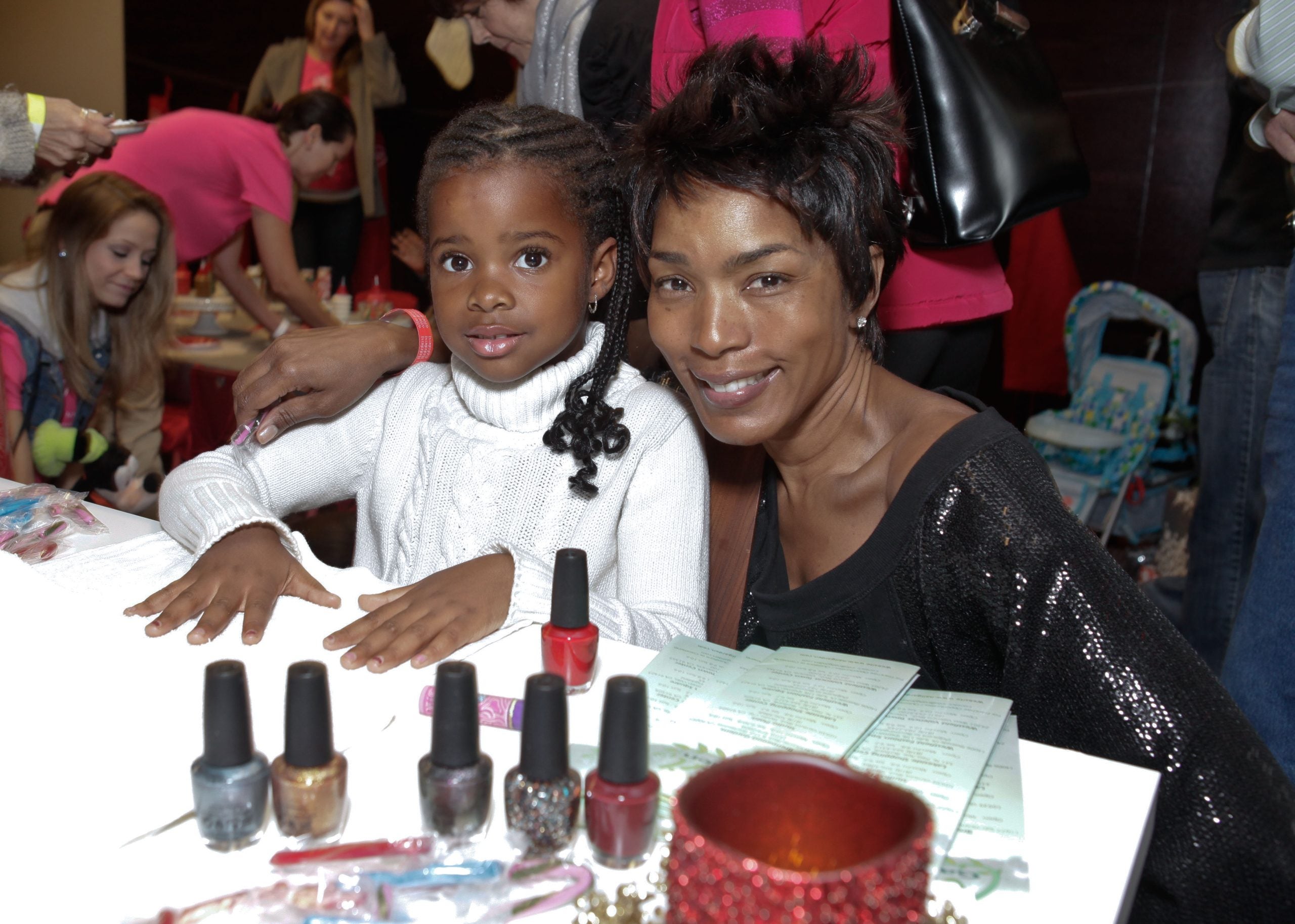 Photos Of Angela Bassett And Her Twins Over The Years