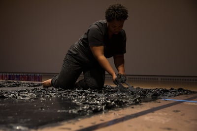 Artist Allana Clarke Addresses Hair Trauma Through Her Work With Weave Glue