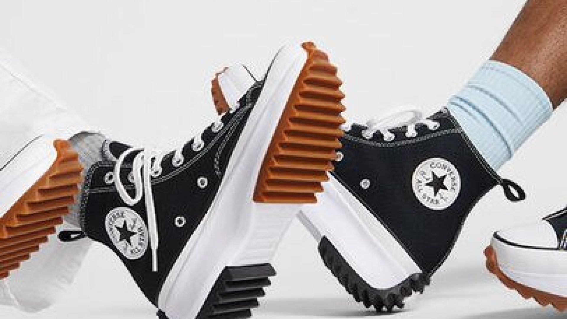 These Platform Sneakers Will Take Your Outfit To New Heights