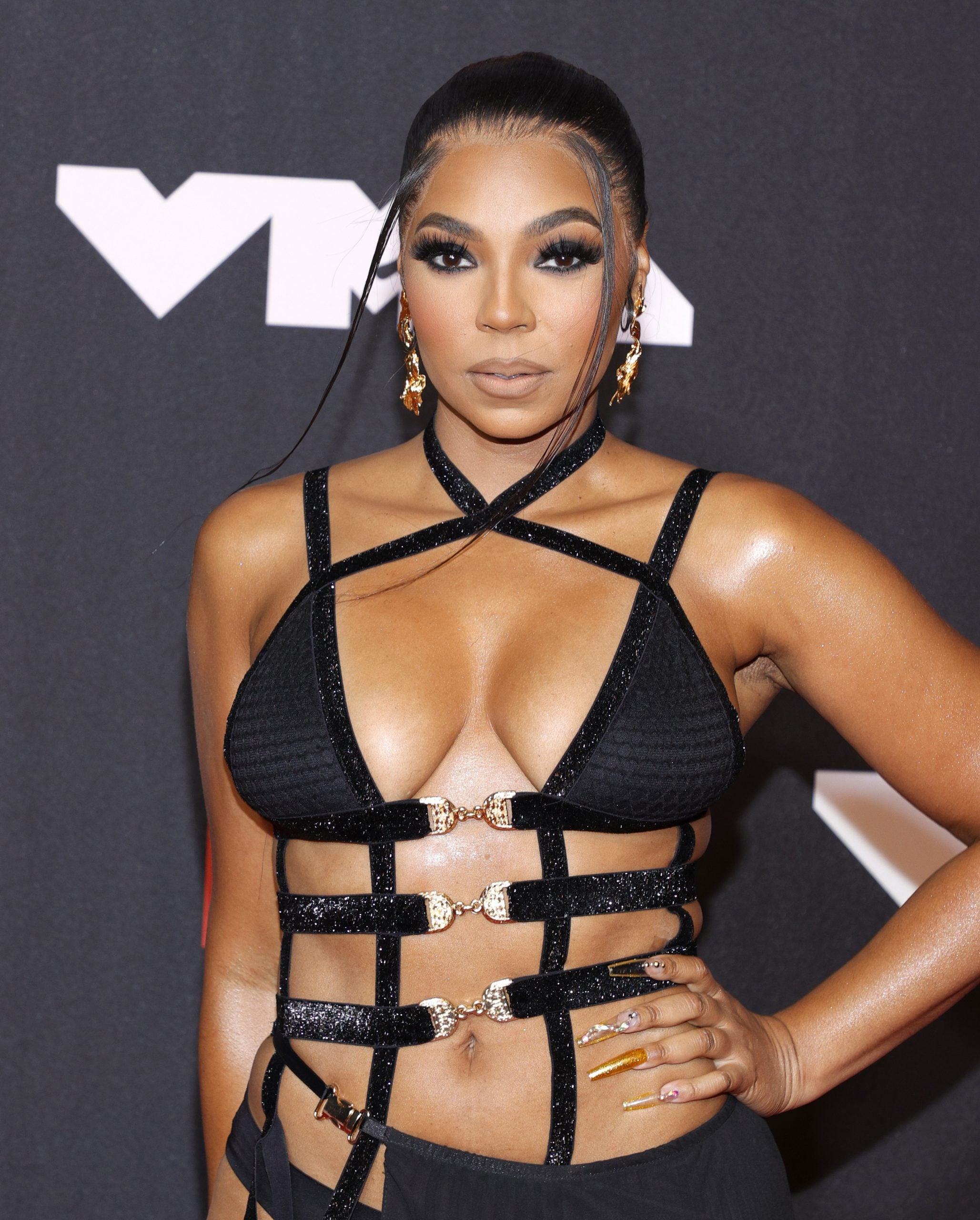 A Look Back At 43 Of Ashanti’s Most Iconic Beauty Looks