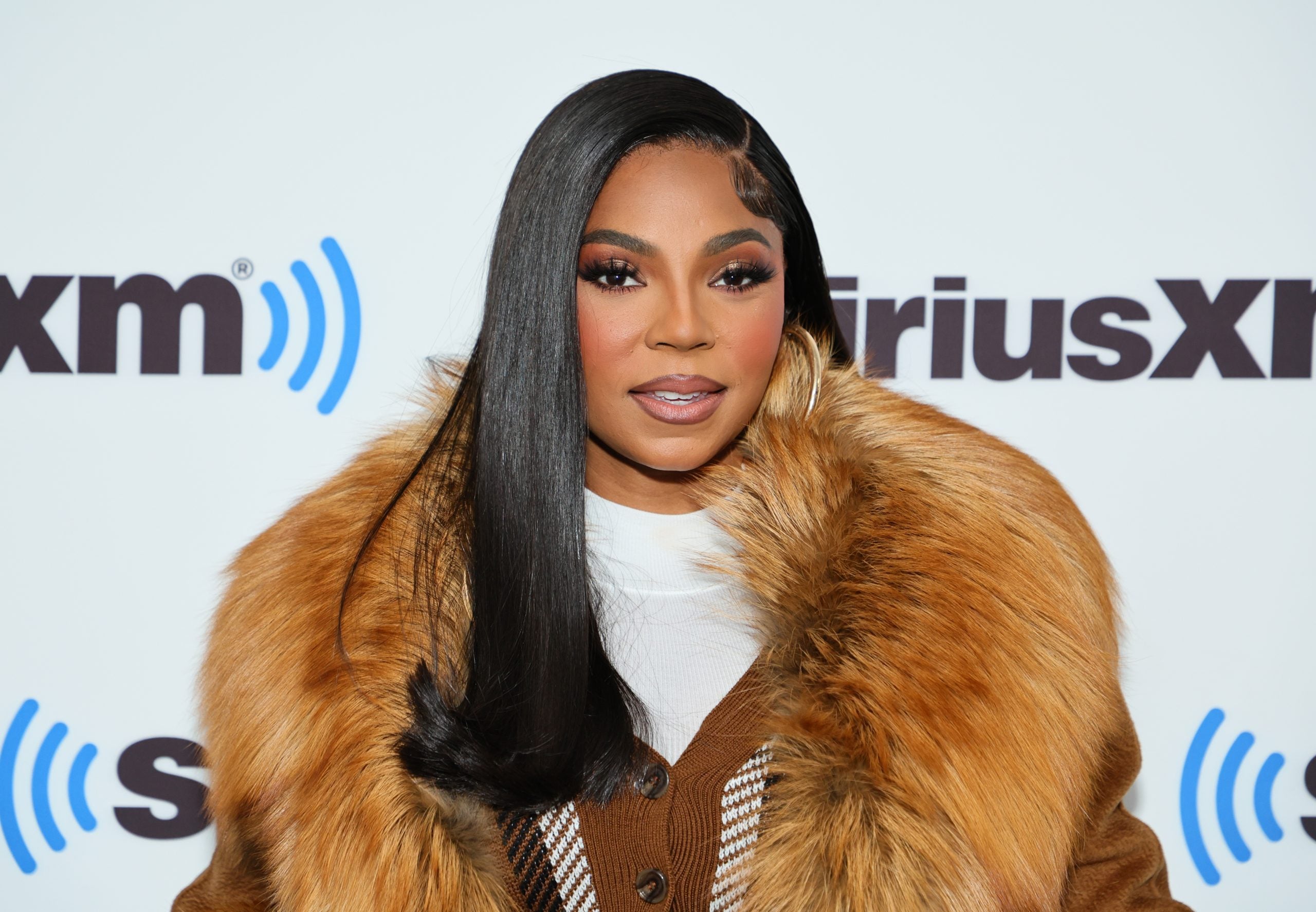 A Look Back At 43 Of Ashanti’s Most Iconic Beauty Looks
