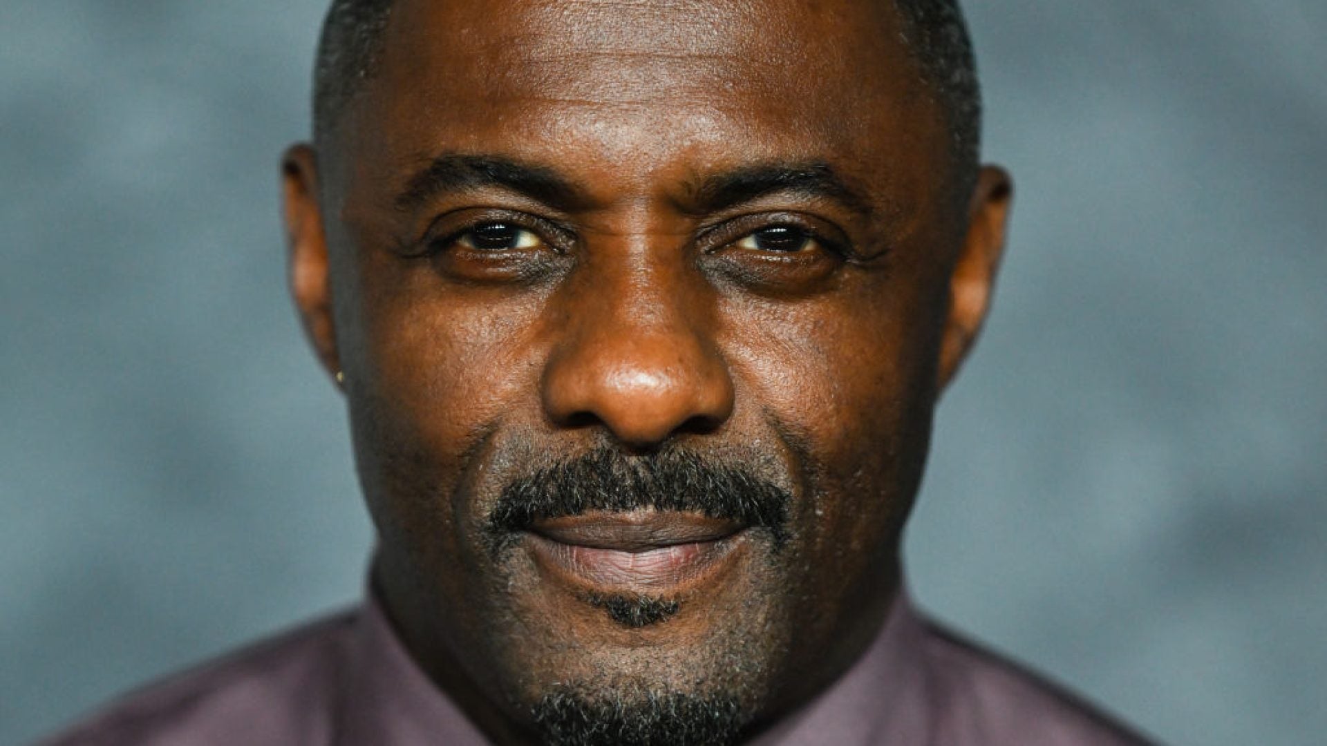 Idris Elba Checked Himself Into Rehab For Work Addiction—Here's Why That's Different From Burnout 