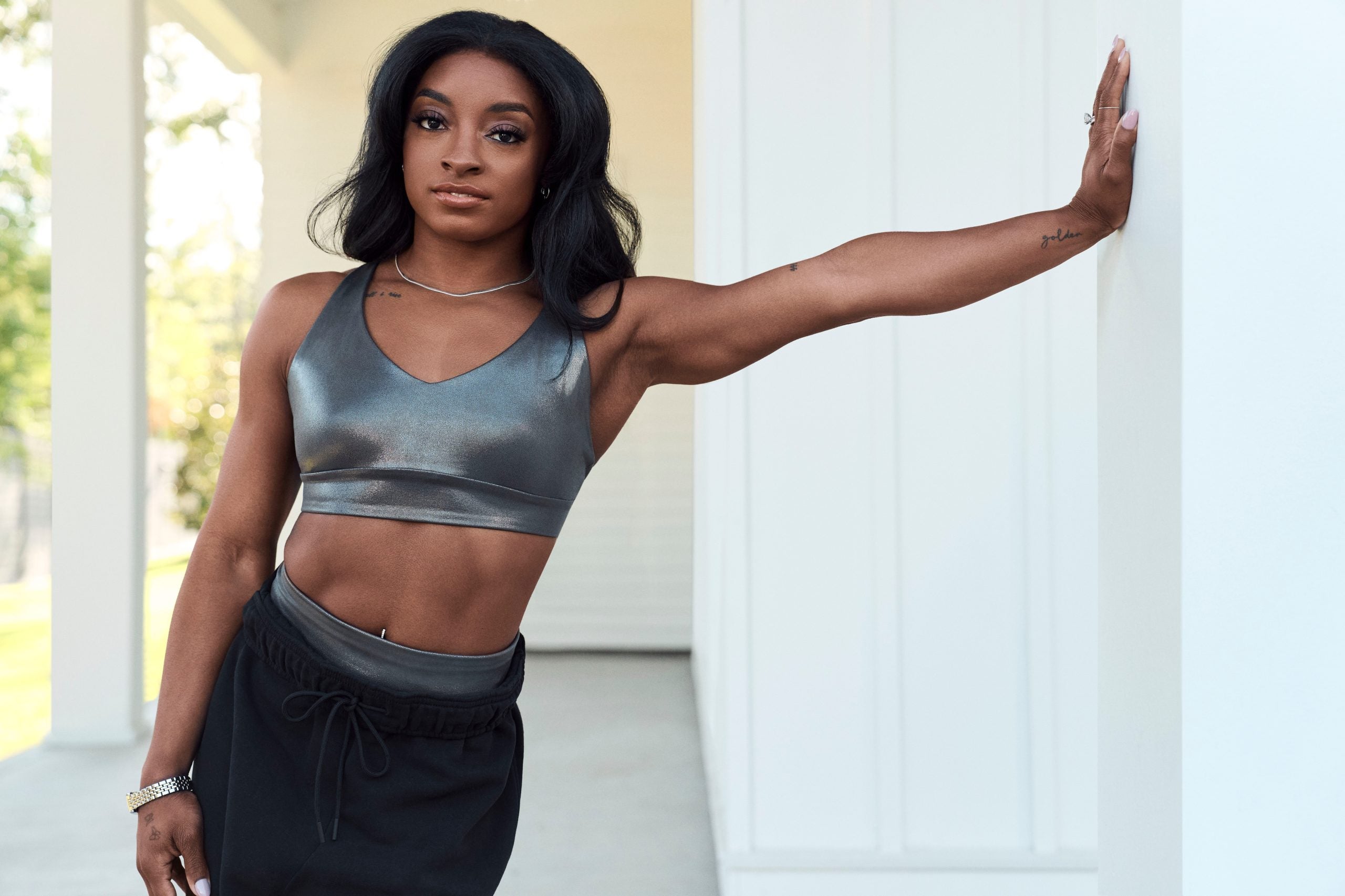 Essence Fashion Digest: Simone Biles Stars In Athleta’s Holiday Campaign, Converse Releases Martine Ali Sneaker, And More