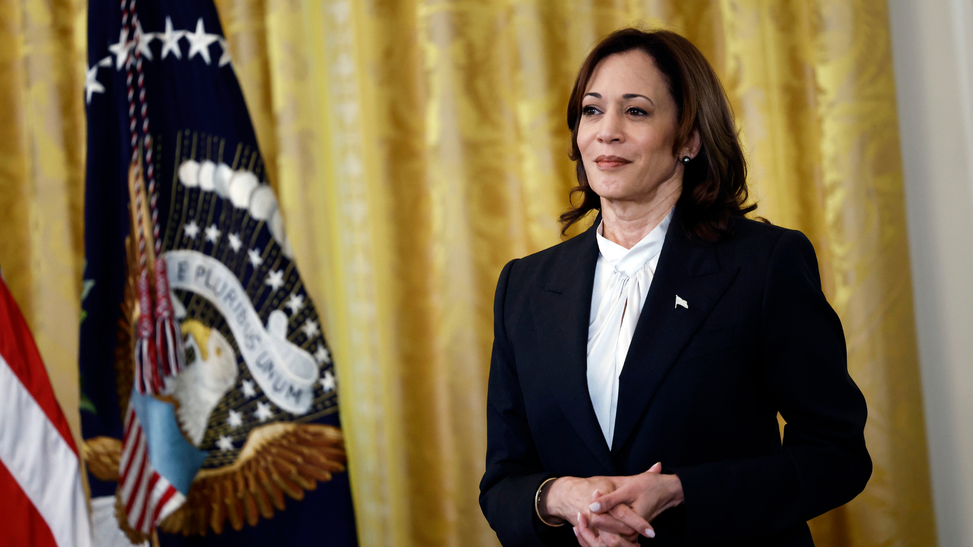 Why Kamala Harris' Suits On Her Campaign Trail Are Important