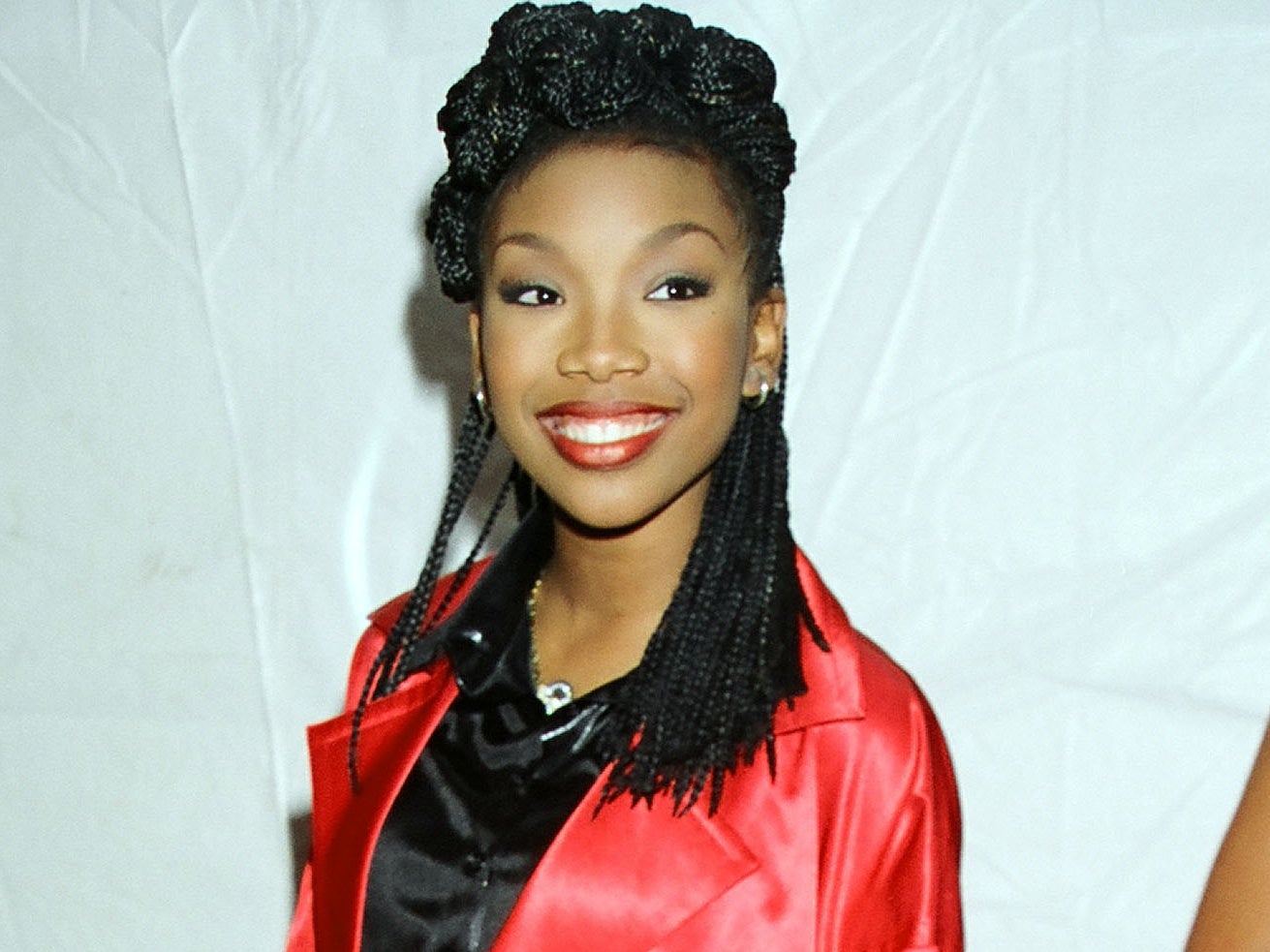 22 Of ESSENCE Cover Star Brandy’s Best Beauty Moments