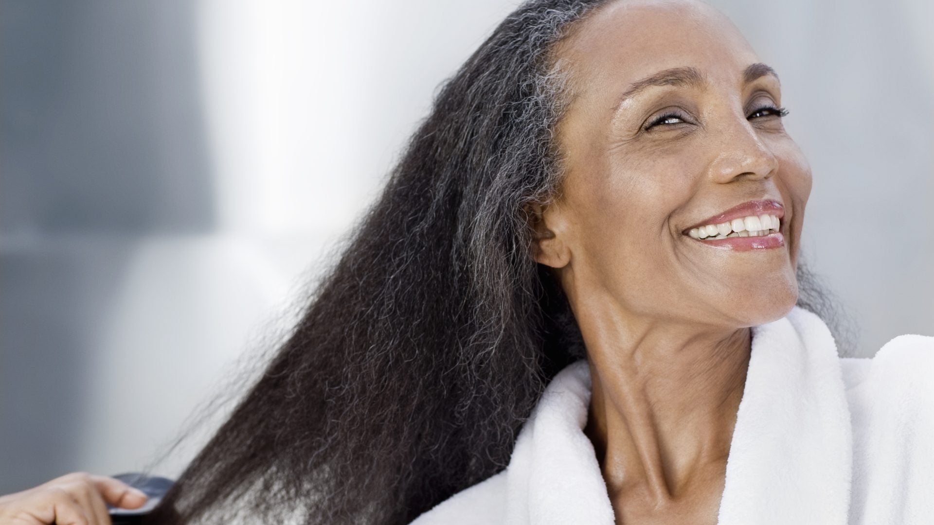 Losing Hair During Menopause? 6 Regrowth Treatments That Actually Work For Textured Hair