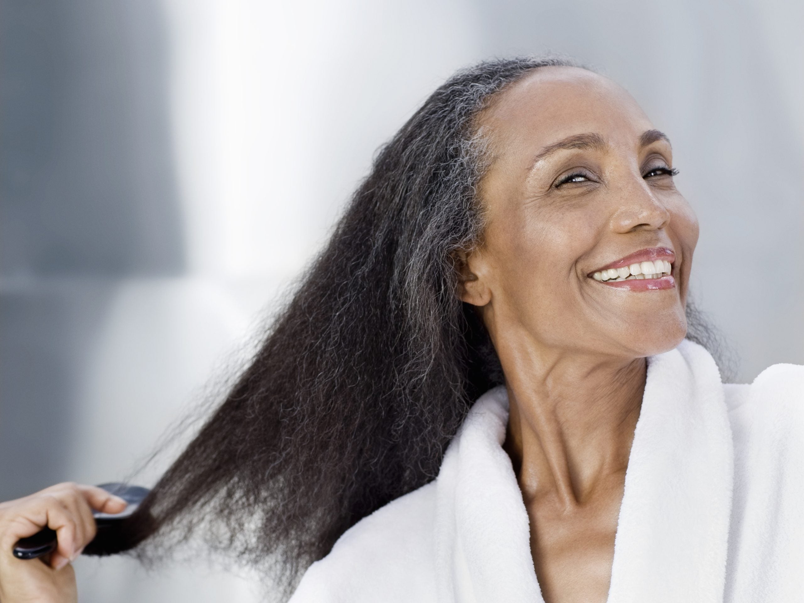 Losing Hair During Menopause? 6 Regrowth Treatments That Actually Work For Textured Hair