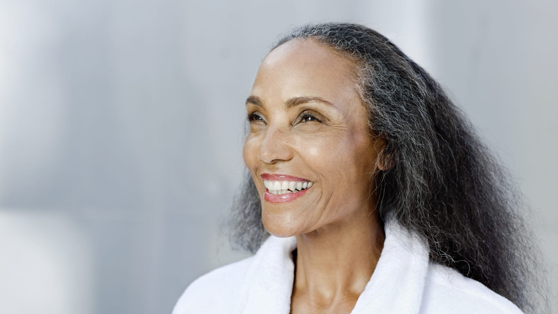 Losing Hair During Menopause? 6 Regrowth Treatments That Actually Work For Textured Hair