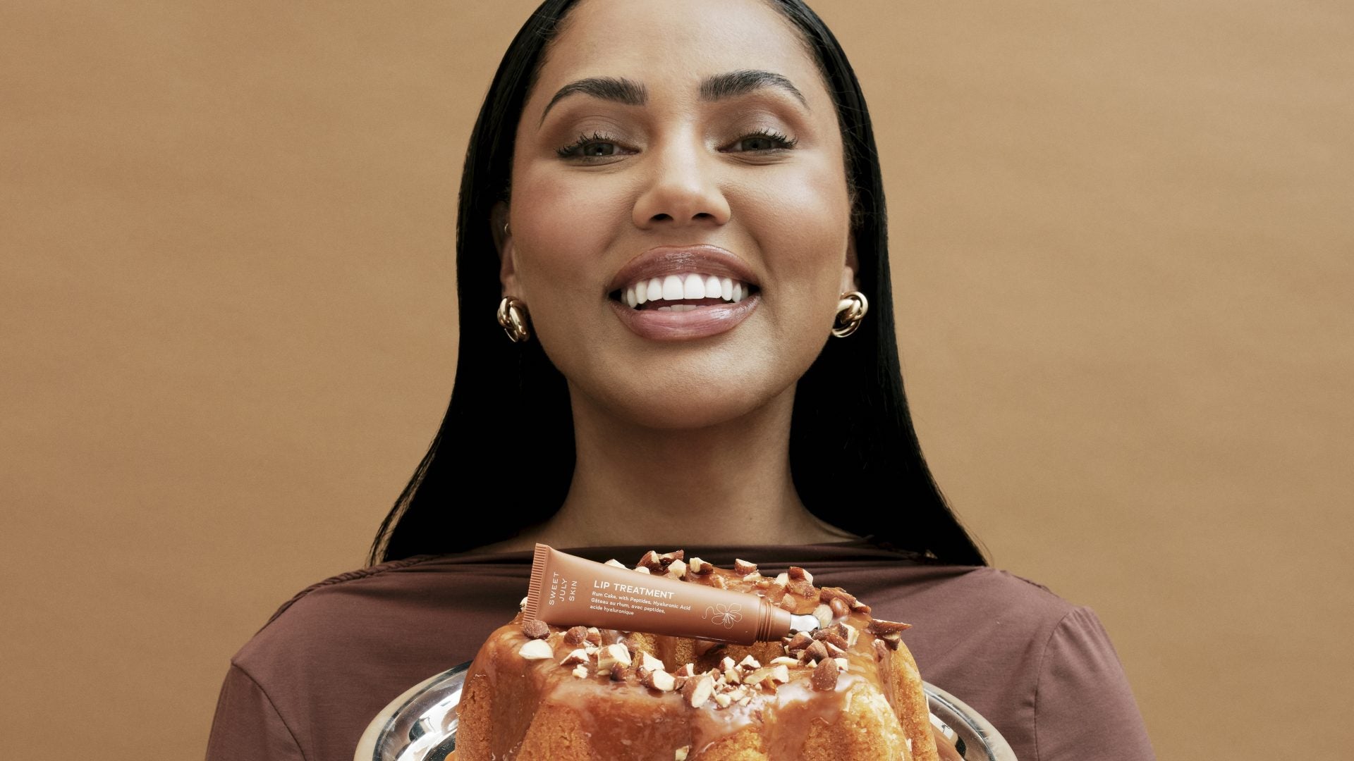 Sweet July Skin Launches New Rum Cake Lip Treatment Inspired By Ayesha Curry’s Jamaican Roots