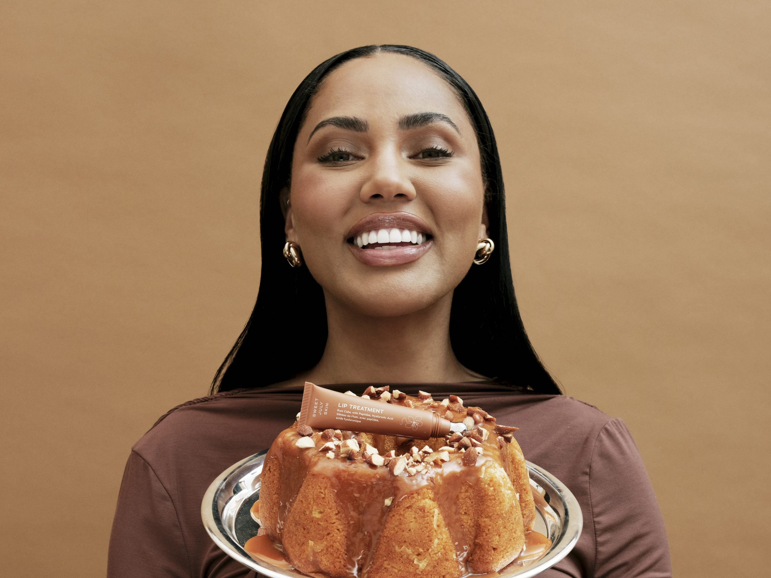 Sweet July Skin Launches New Rum Cake Lip Treatment Inspired By Ayesha Curry’s Jamaican Roots