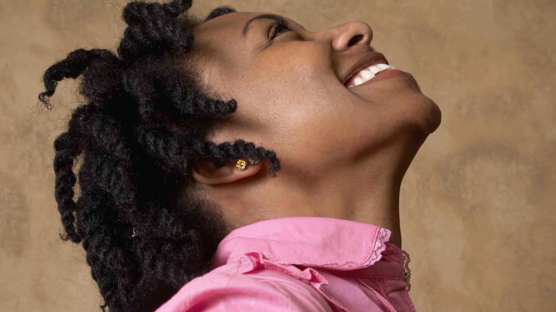 Why Mini Twists Might Be Your Key To Hair Growth This Winter