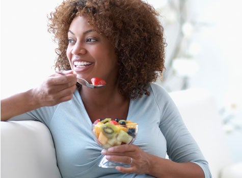 black-woman-eating-fruit-475x350.jpg