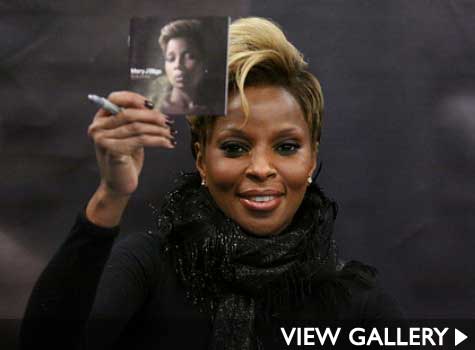 mary-j-blige-holding-album-cover.jpg