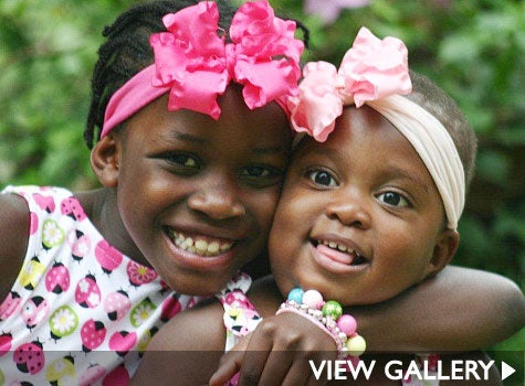 mom-adopts-two-haitian-girls-sashes.jpg
